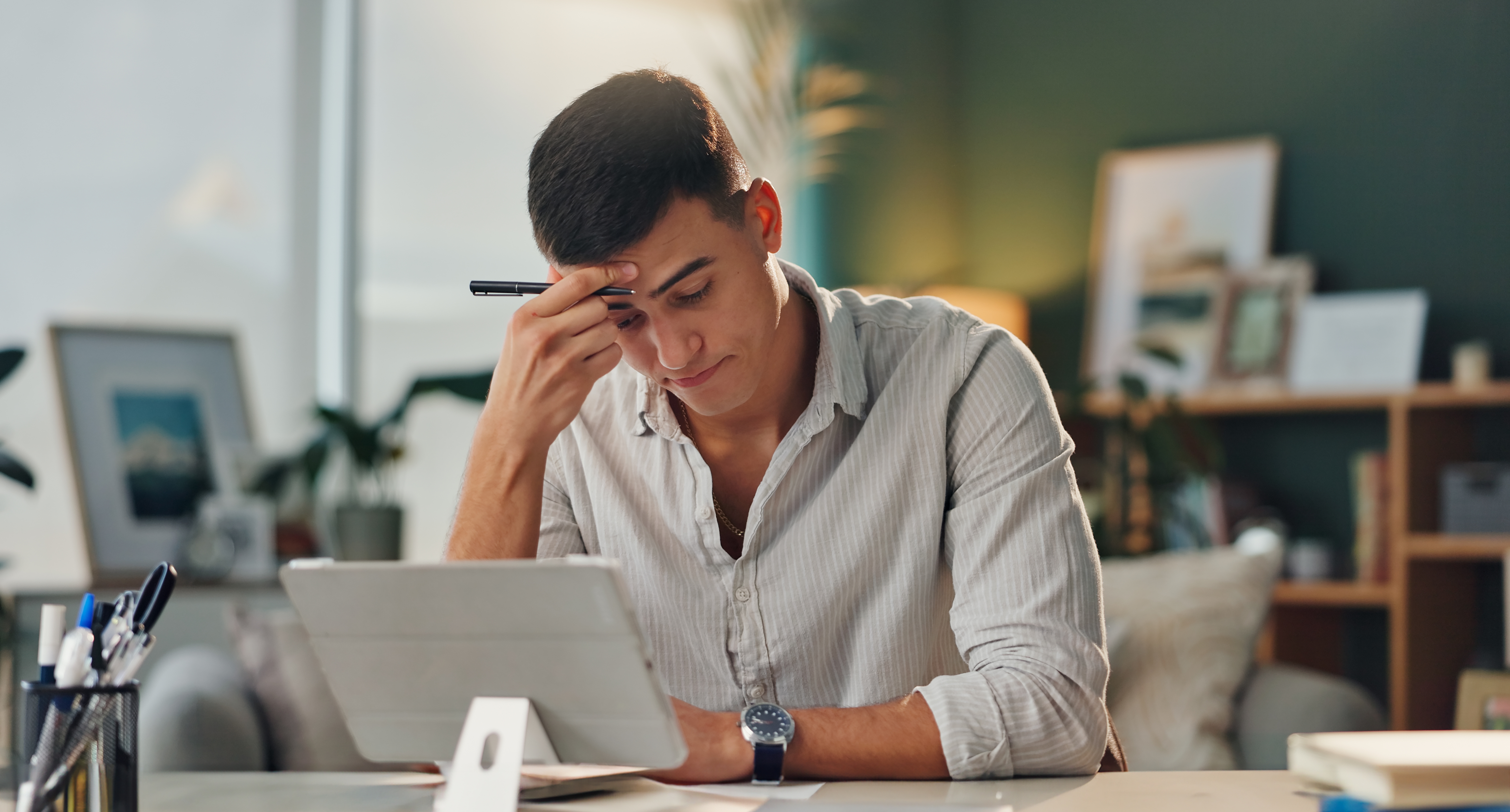 young man thinking of career path to take